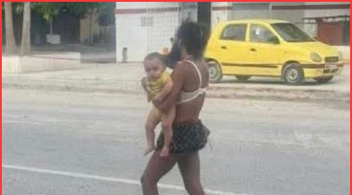Hombre con posible trastorno mental camina con bebé en brazos sobre el 27 en Ciudad Victoria